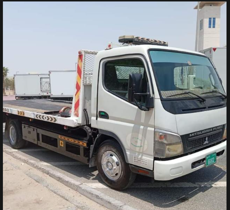 Younas Recovery Transport Mitsubishi Fuso flatbed truck